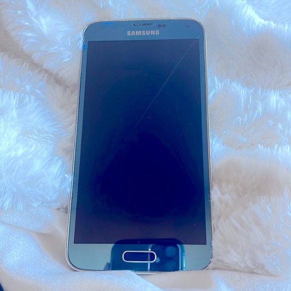 Samsung Galaxy S5,‎ Teal AT&T - Picture 1 of 5